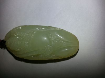 求高手指點(diǎn)這兩塊玉是什么品種,是和田玉還是青海還是韓料還是俄料。我買成3300,朋友說(shuō)是和田的山料。